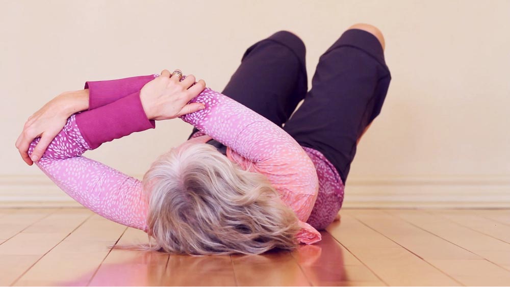 Anne stretching on the ground